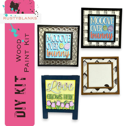 a group of four framed pictures on a wall