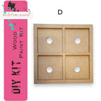 a cardboard box with four holes cut out of it