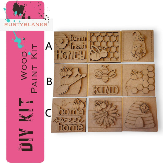 a set of four wooden stamps with words and animals