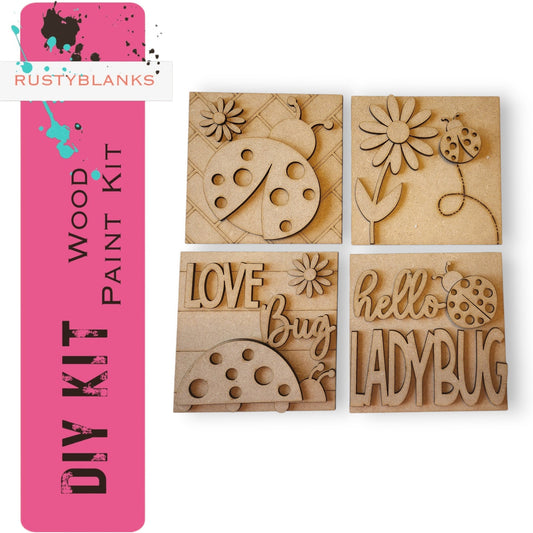 a set of four wooden stamps with ladybugs