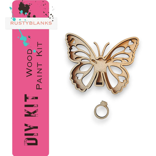 a metal butterfly with a pink tag next to it