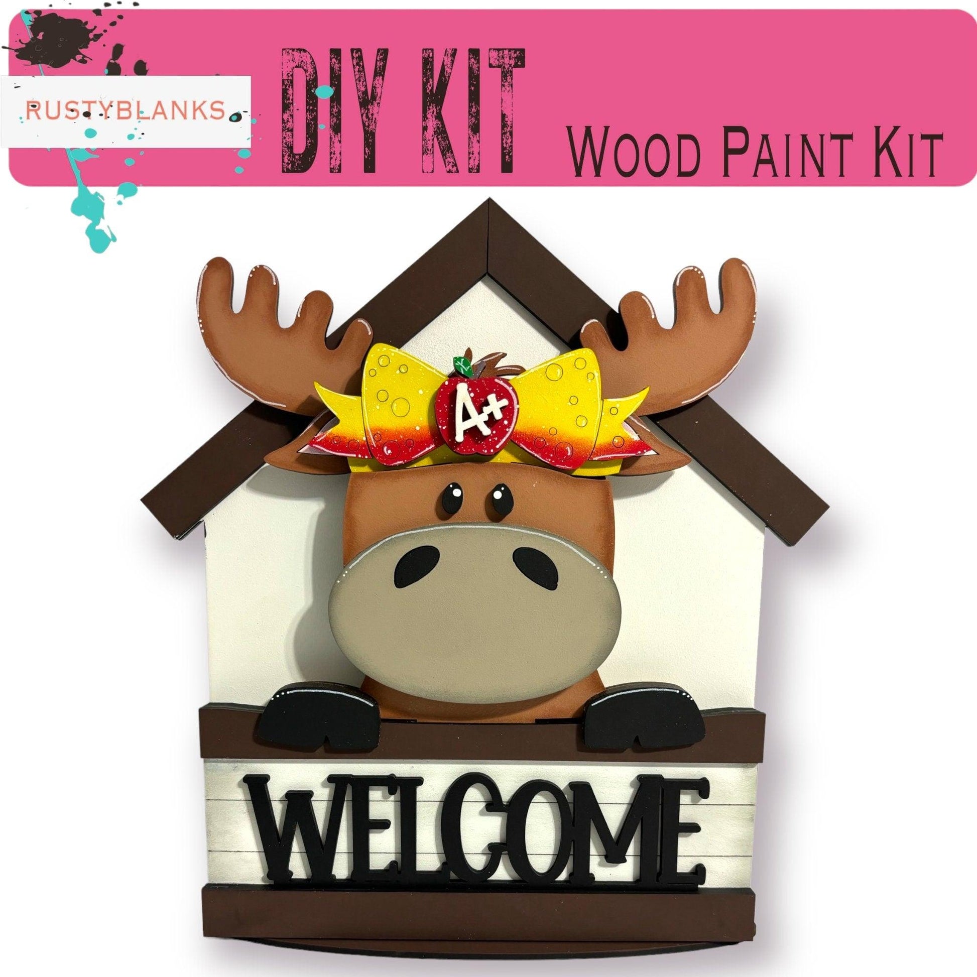 a wooden sign with a moose wearing a bow