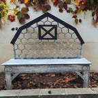 a wooden bench sitting in front of a building
