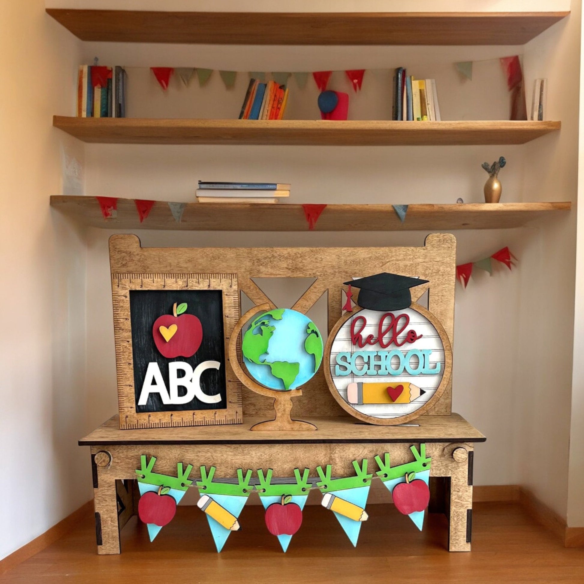 a wooden shelf with a sign and some decorations on top of it