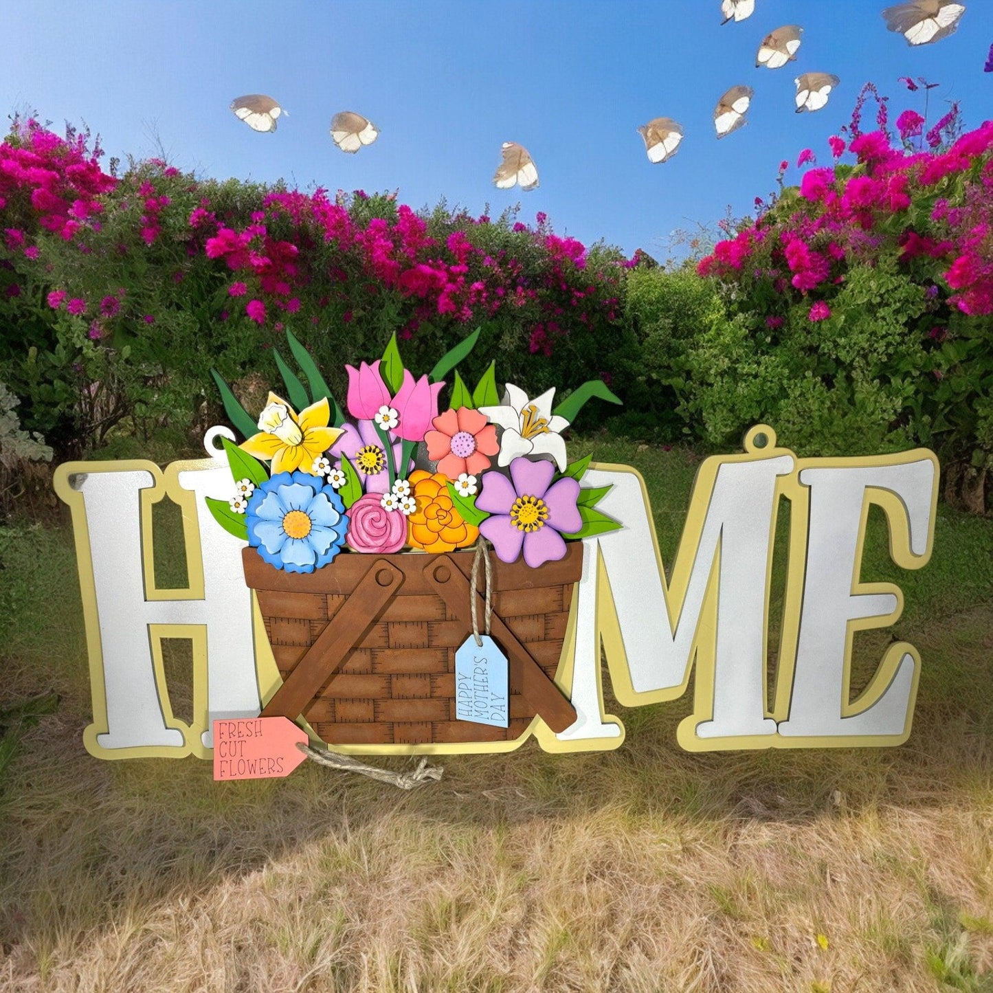 a sign that says home with a basket of flowers