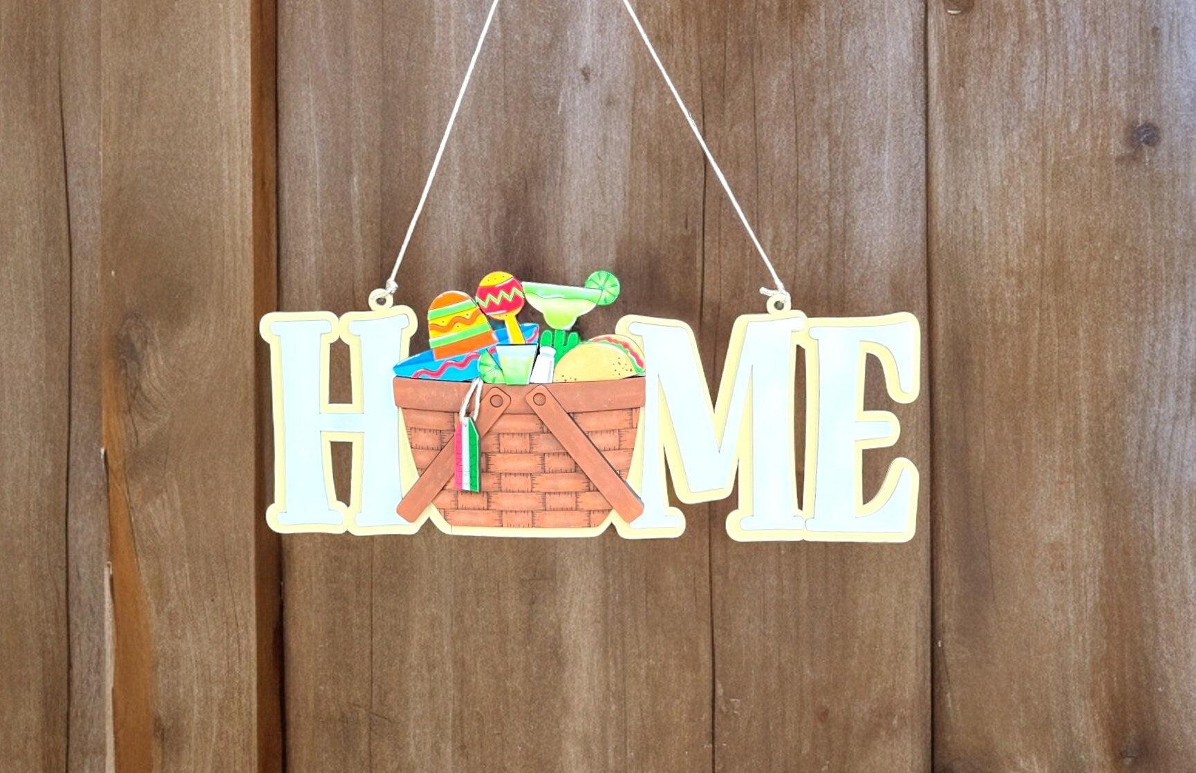 a home sign hanging on a wooden wall