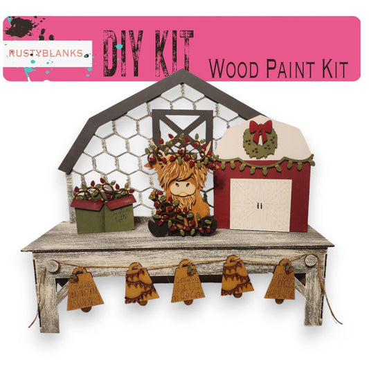 a picture of a wooden paint kit with a barn