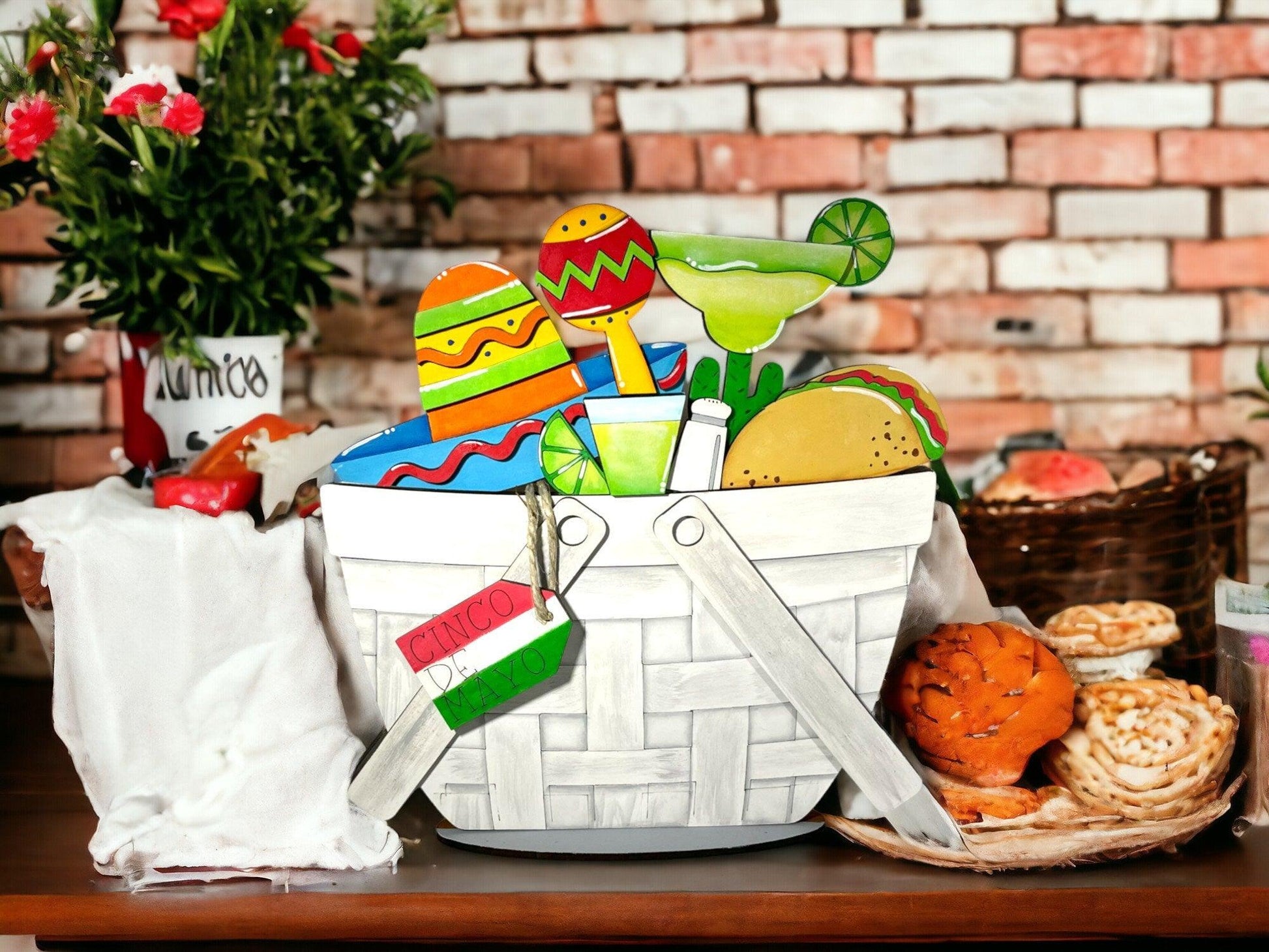 a white basket filled with lots of food on top of a table