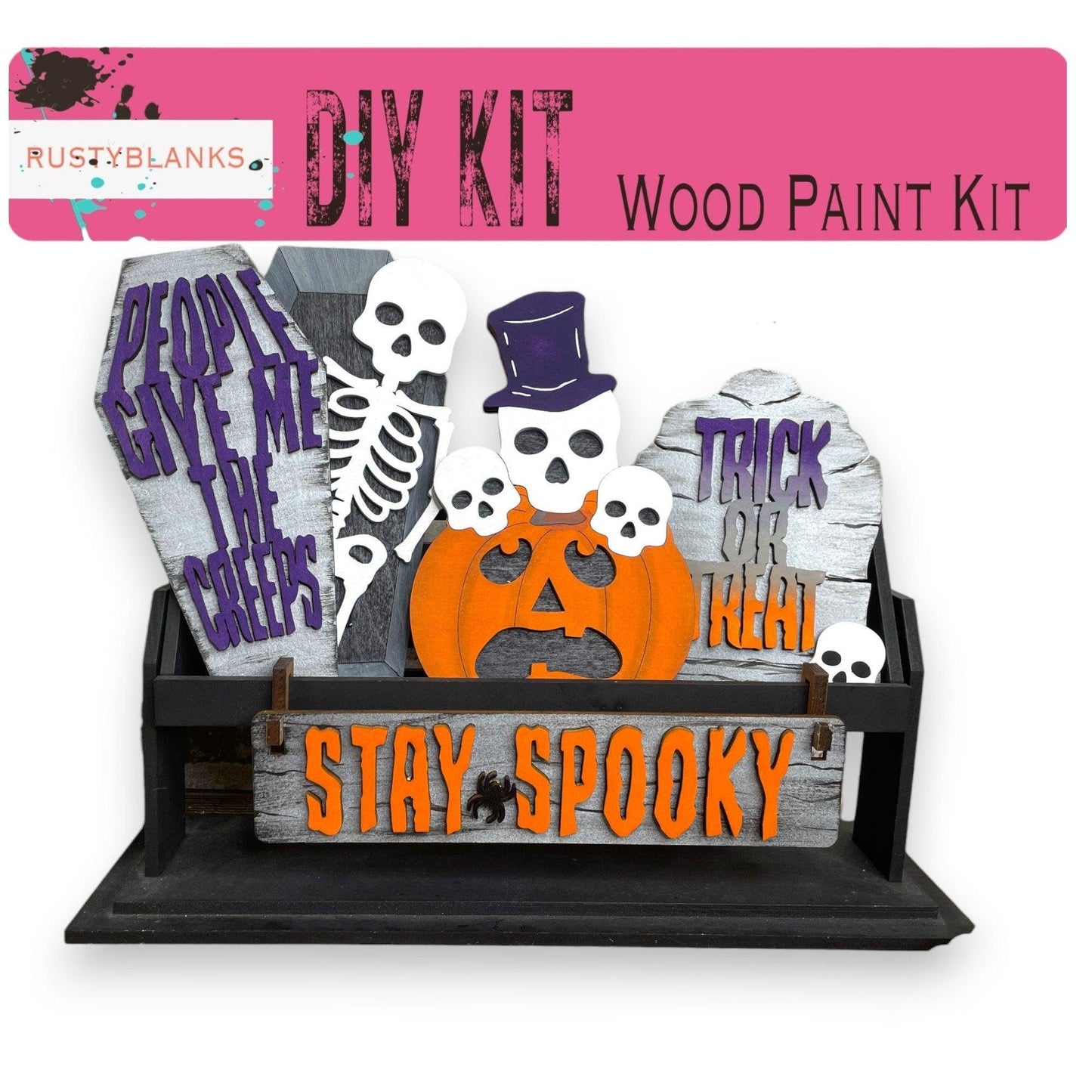 a wooden paint kit with halloween decorations