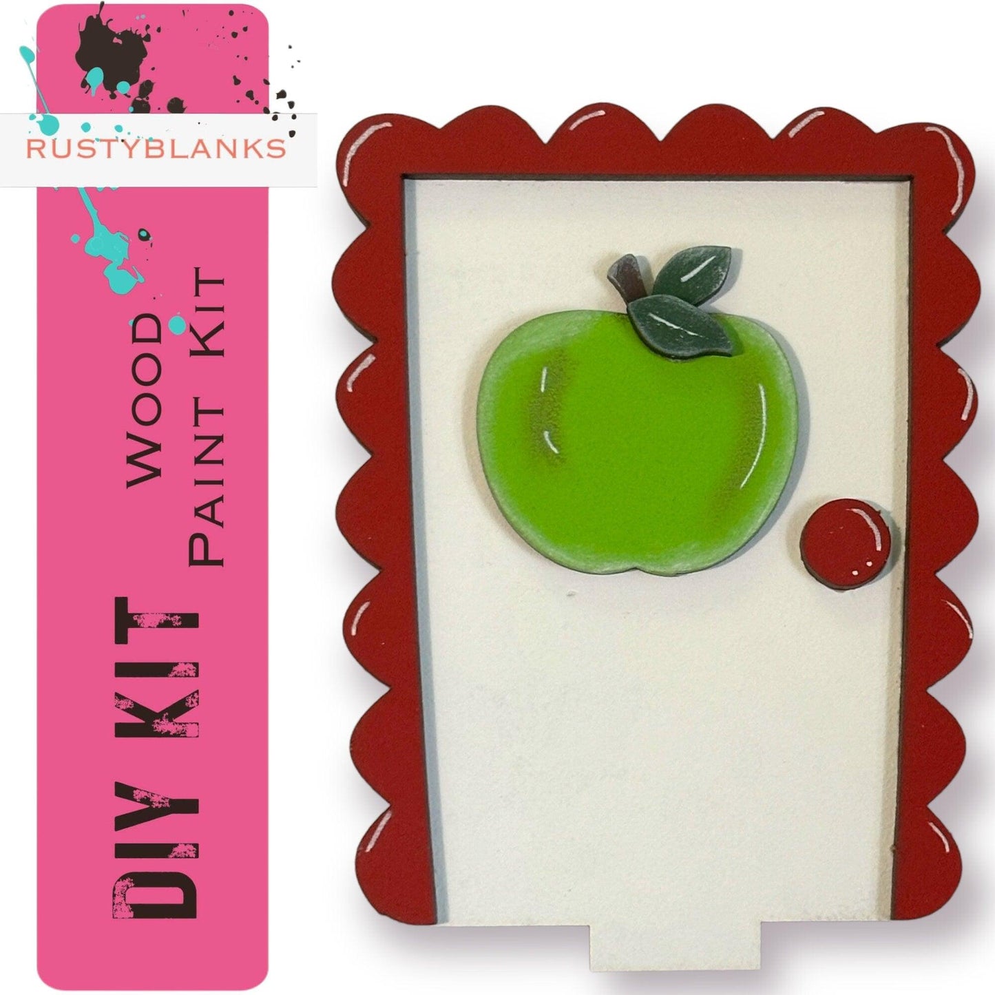 a picture frame with a green apple on it