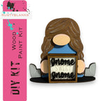 a wooden sign with a girl holding a sign that says phone sweet home