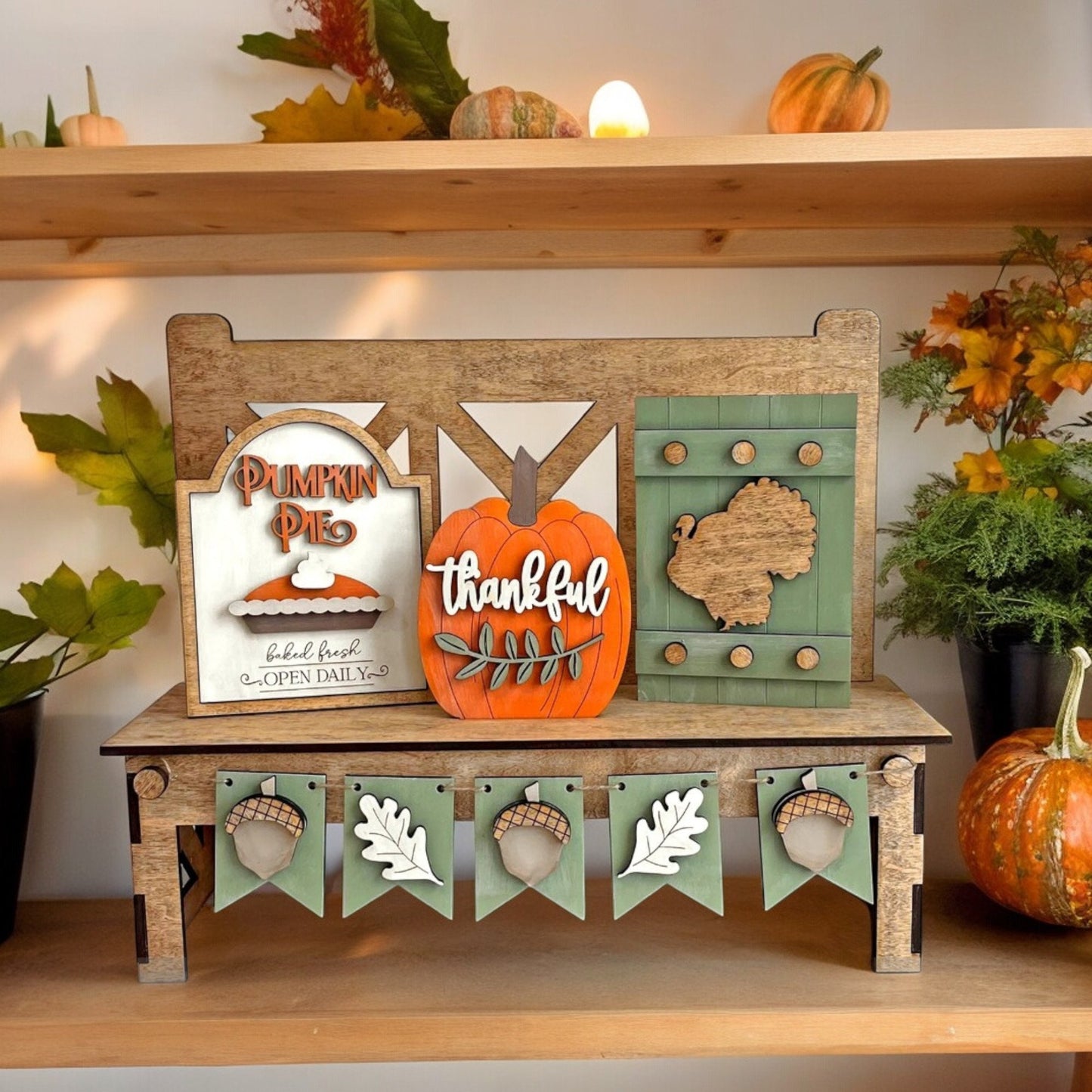 a shelf with a bunch of pumpkins on it