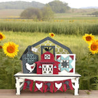 a farm scene with sunflowers and a barn