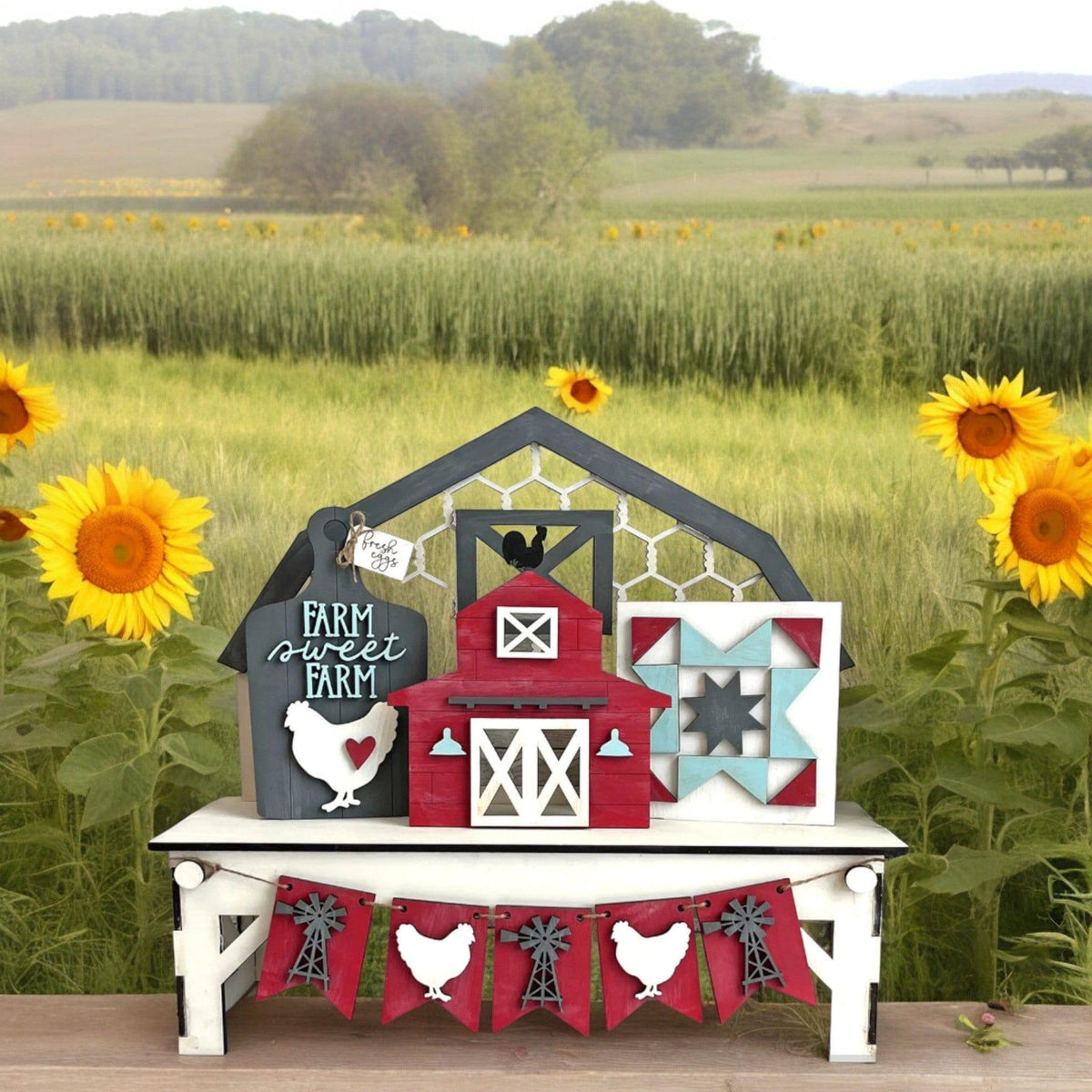 a farm scene with sunflowers and a barn