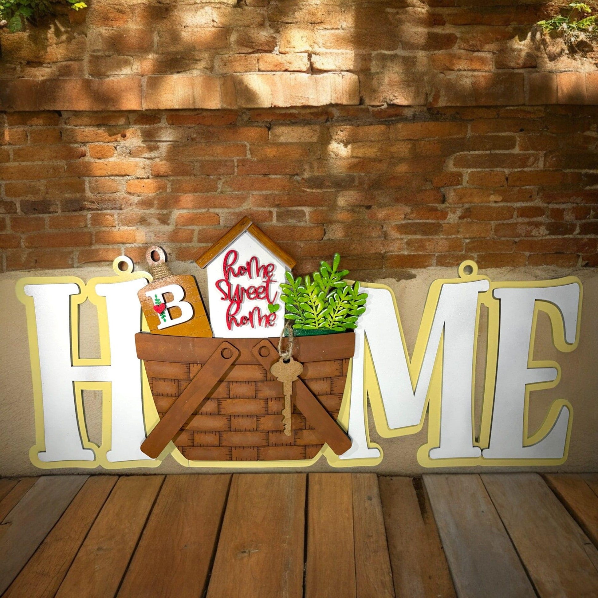 a sign that says home with a potted plant