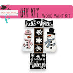 a snowman and a snowman are made out of wood
