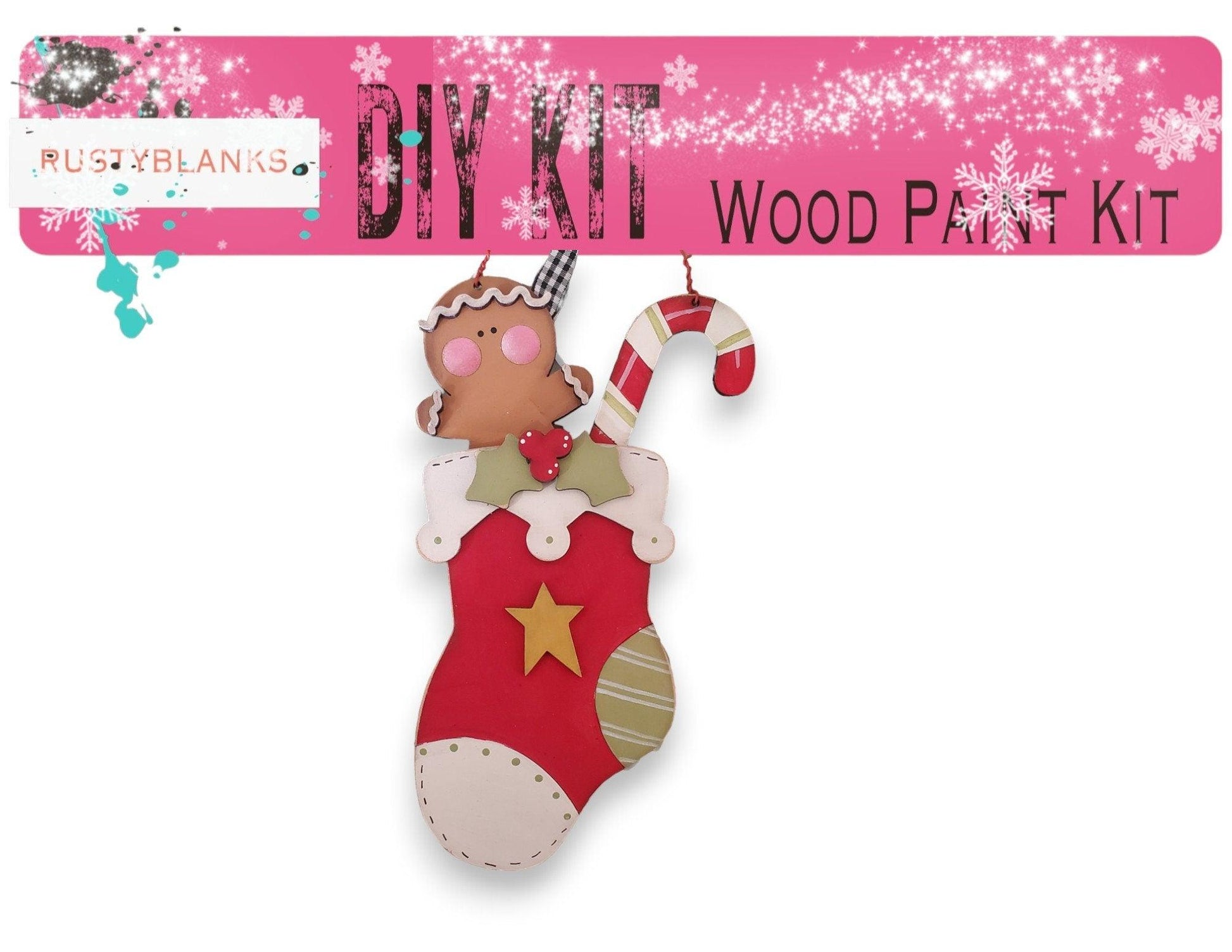 a christmas stocking ornament hanging from a pink ribbon