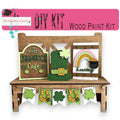 a wooden bench with a st patrick's day decoration