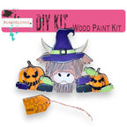 a picture of a wooden paint kit with a witch
