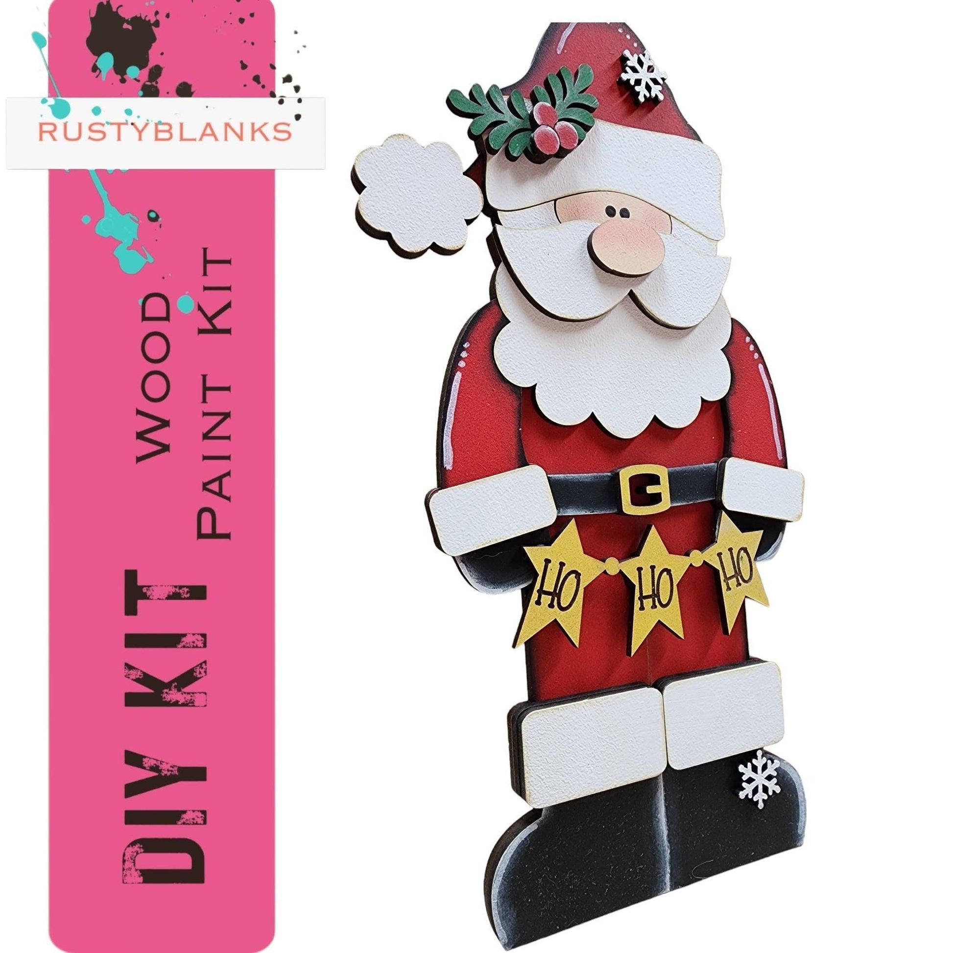 a cardboard christmas decoration with a santa clause