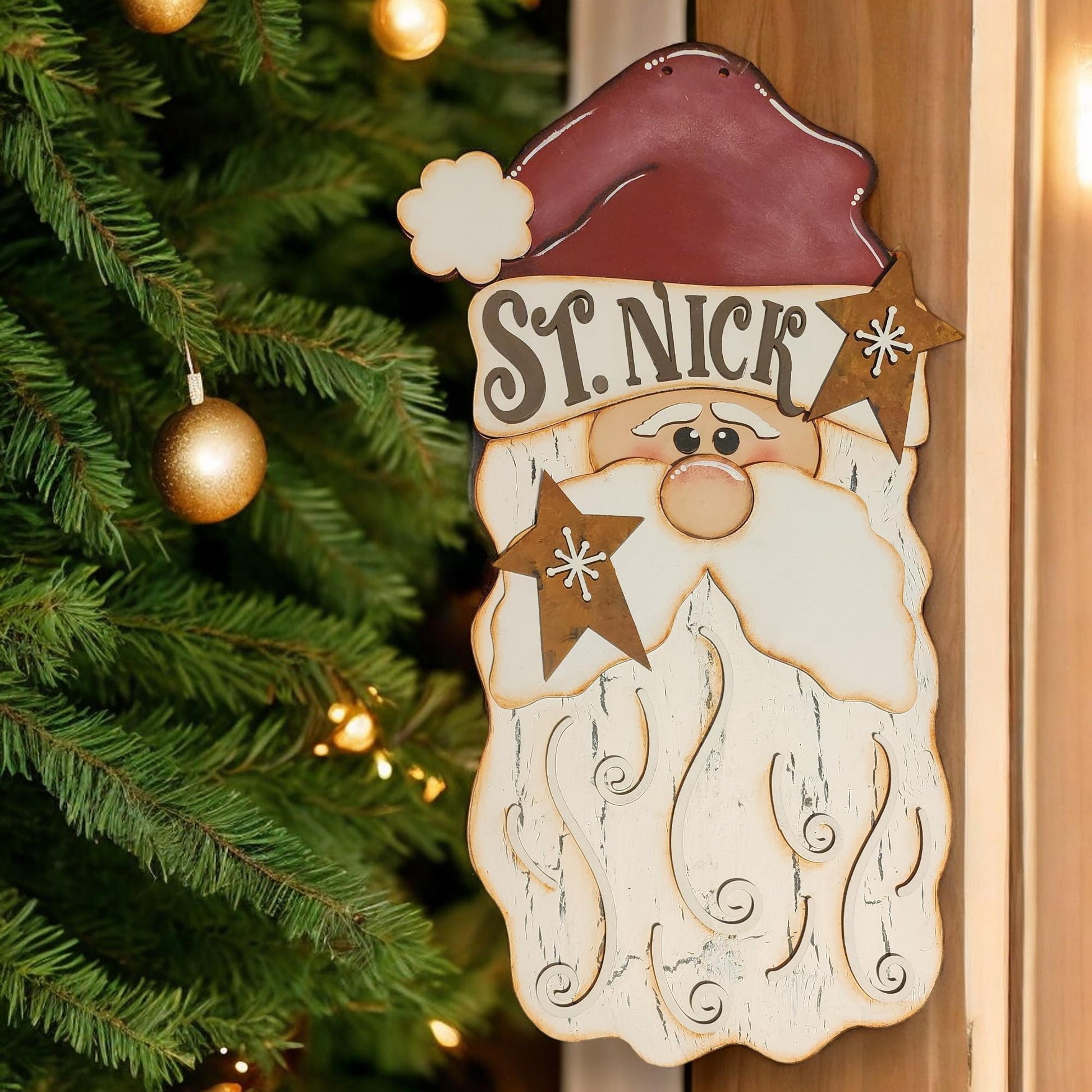 a wooden sign with a santa clause on it