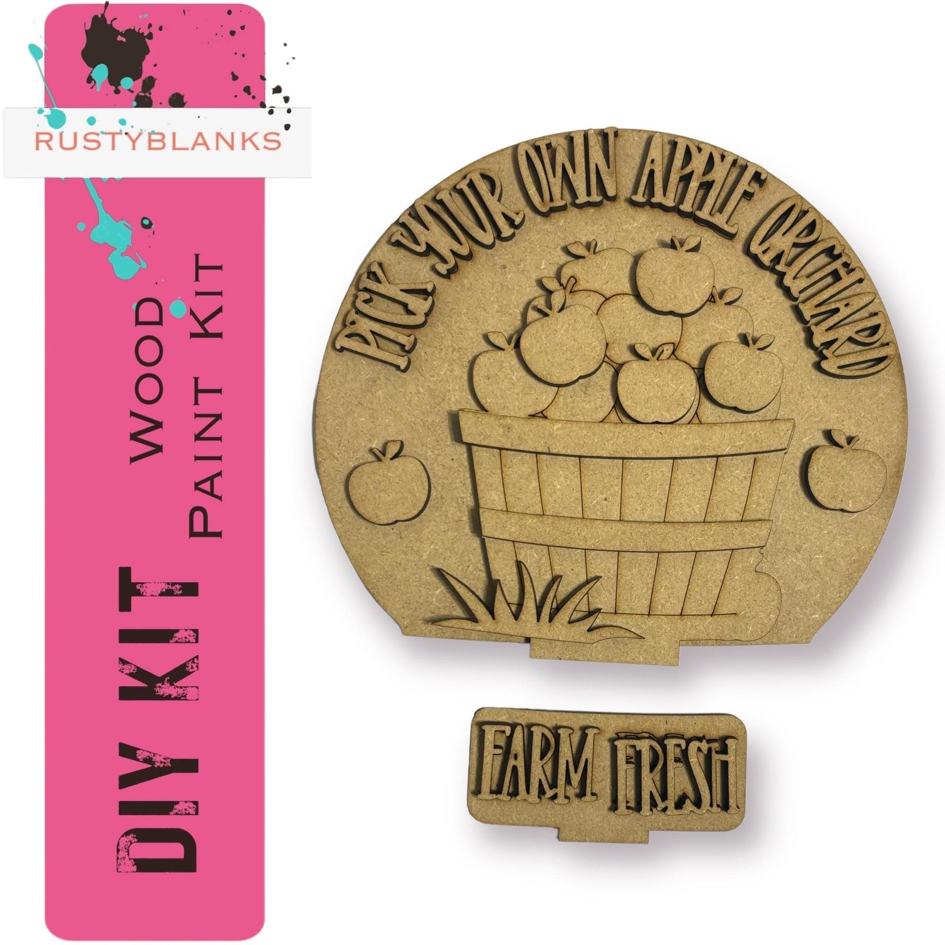 a wooden stamp with a basket of apples on it