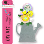 a picture of a flower arrangement in a watering can