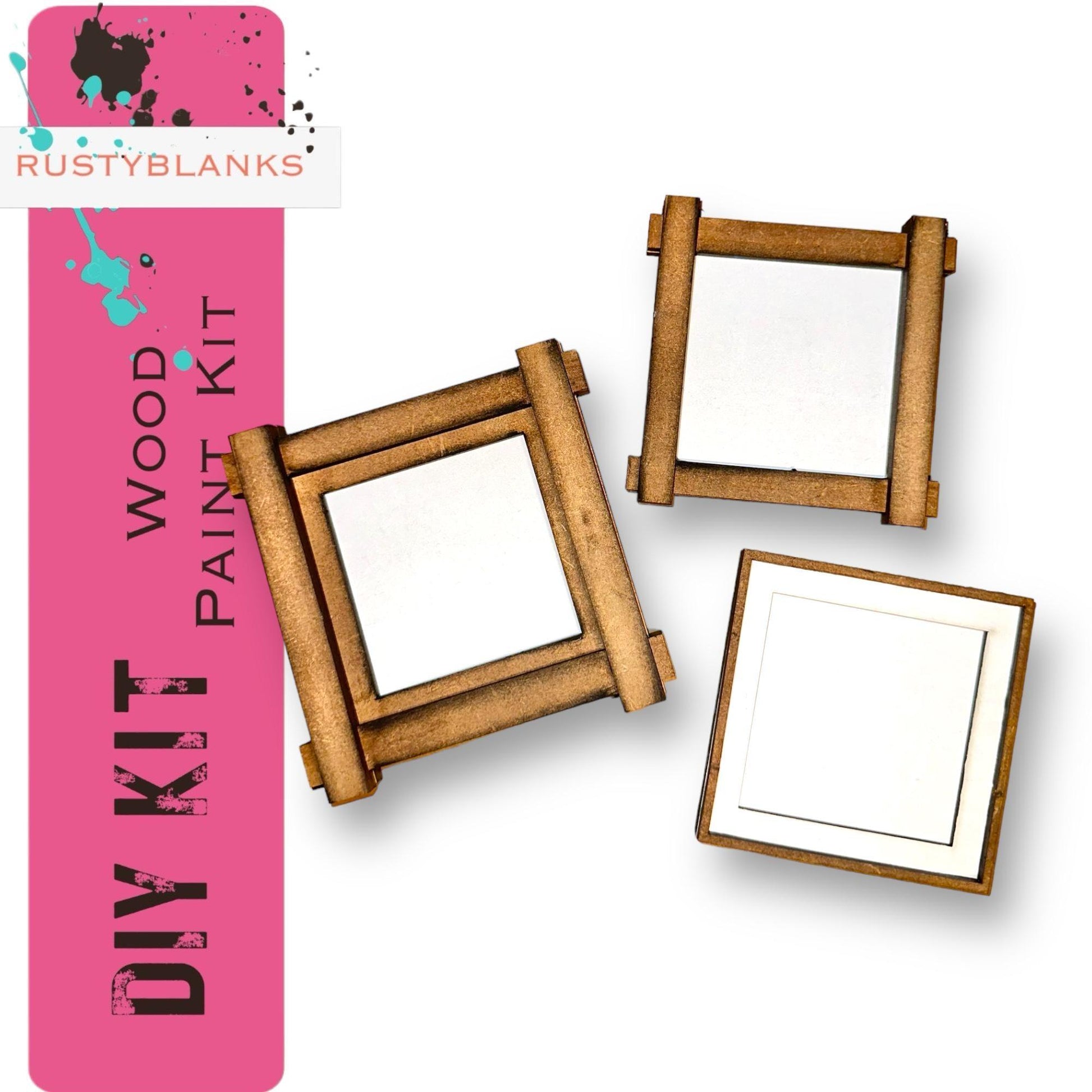 three wooden frames with white paper on them