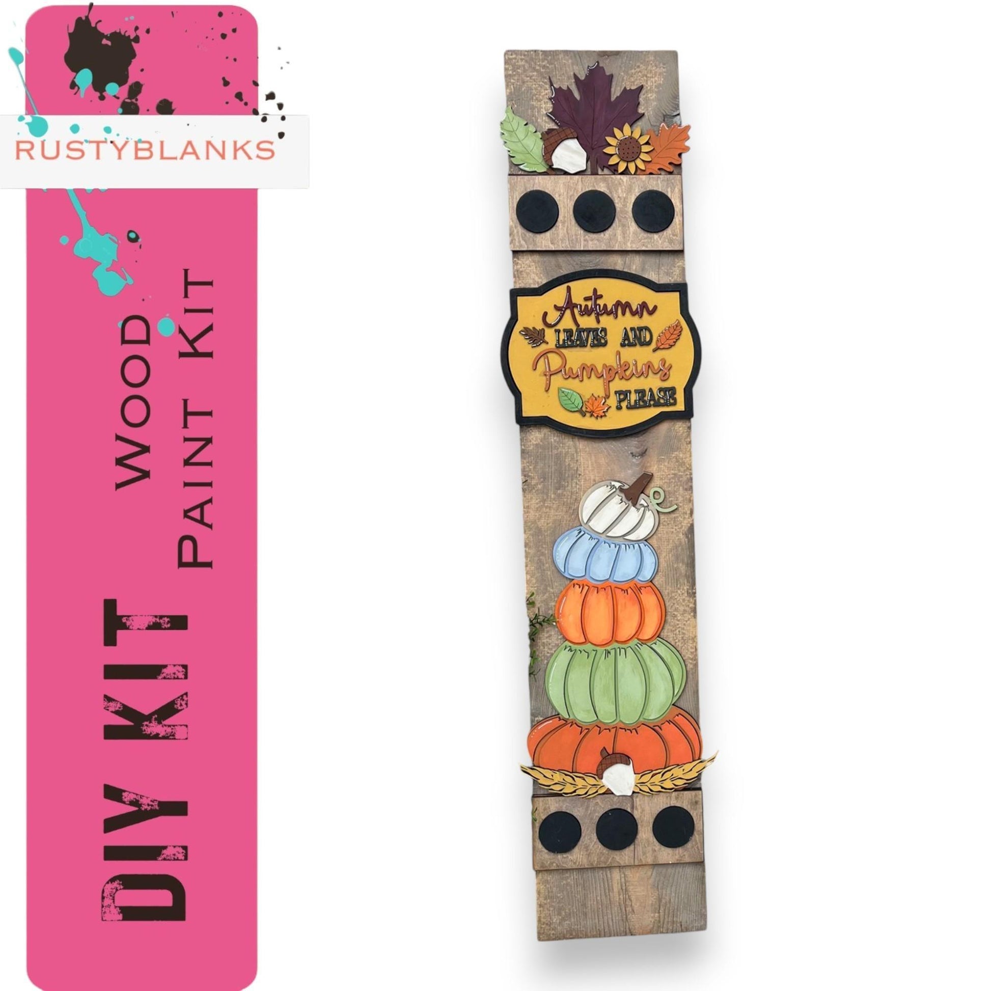 a wooden plank with a picture of pumpkins on it