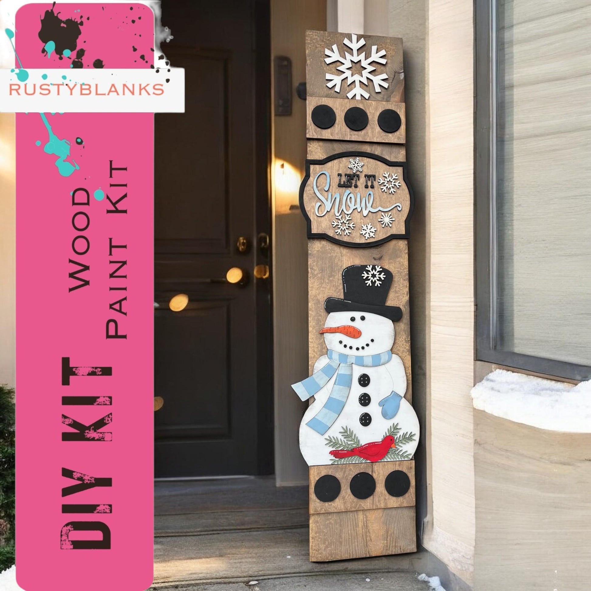 a wooden sign with a snowman painted on it