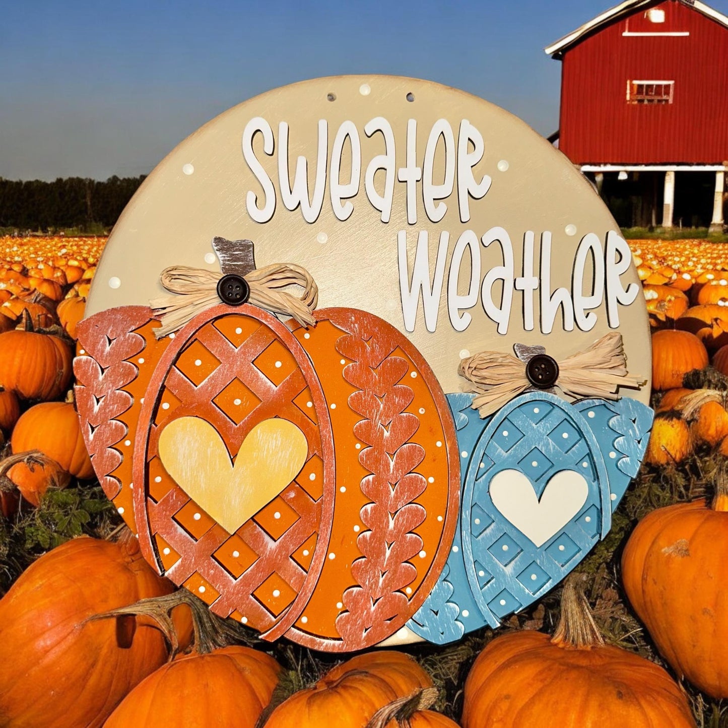 a pumpkin patch with two pumpkins and a sign that says swaffle weather