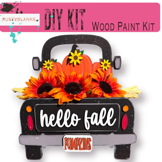 a truck decorated with sunflowers and pumpkins