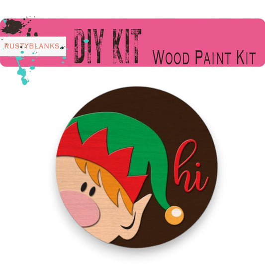 a wooden button with a elf's head on it