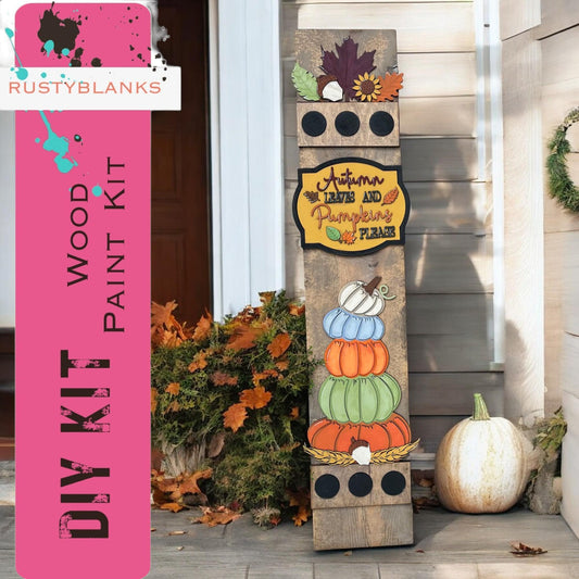 a wooden sign sitting on the side of a building