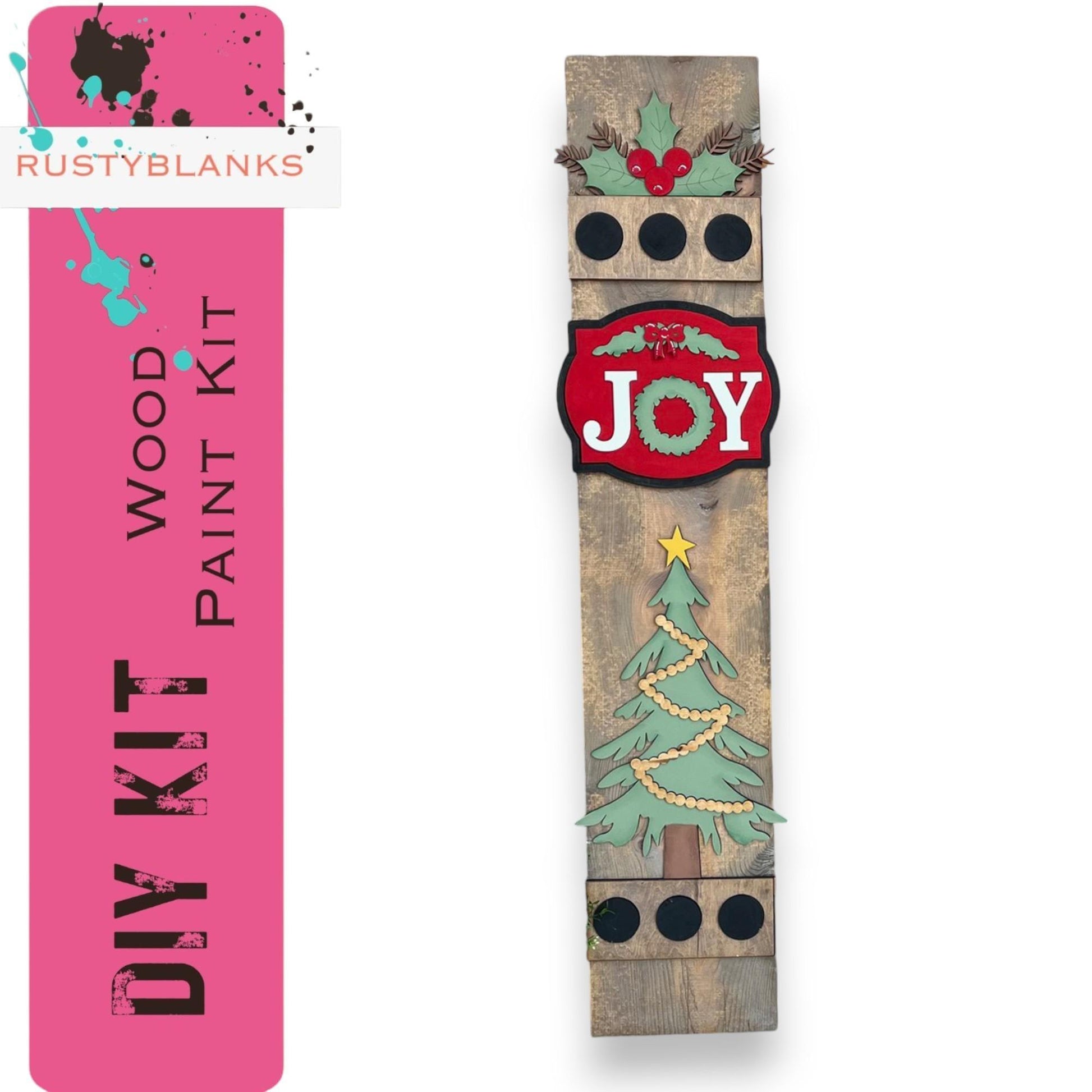 a wooden plank with a christmas tree painted on it