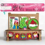 a wooden bench with a christmas decoration on it