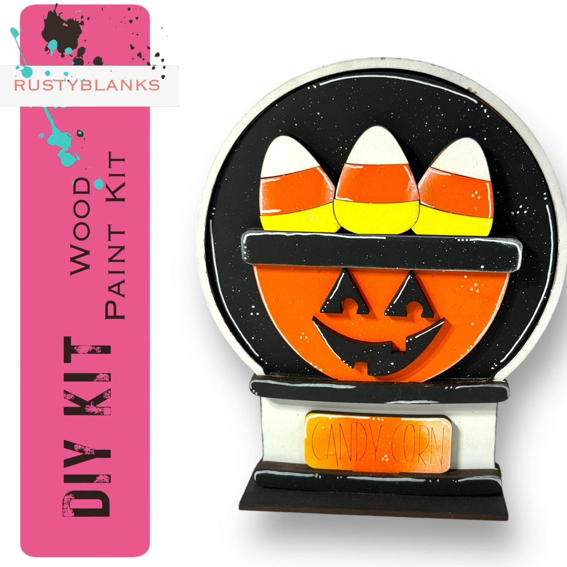 a candy dispenser with candy in the shape of a pumpkin