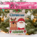 a wooden christmas ornament hanging from a christmas tree