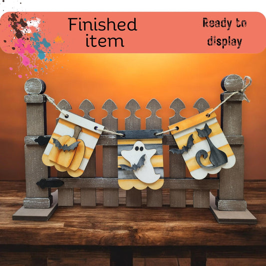 a picture of a wooden fence with a banner on it