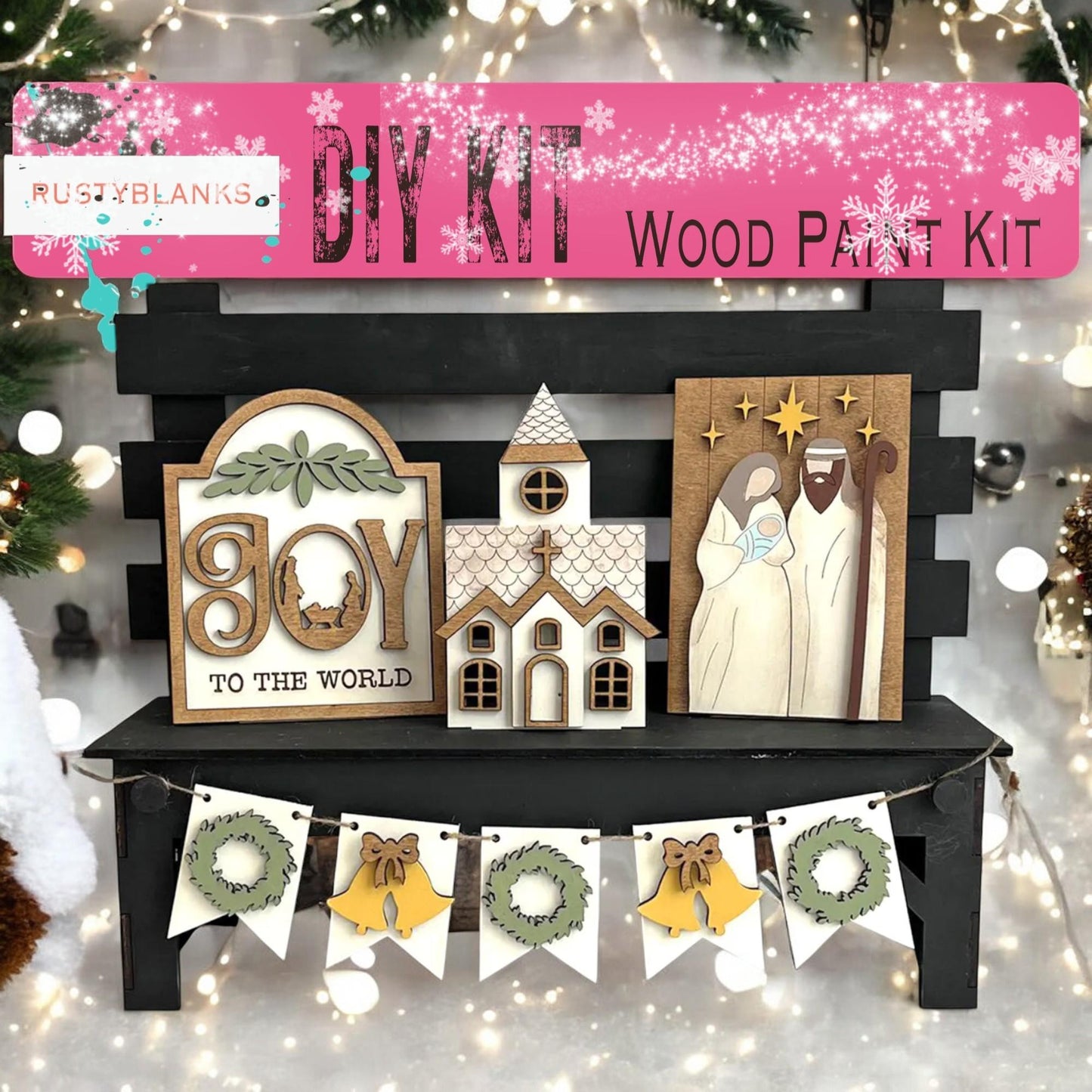 a wooden nativity kit is displayed in front of a christmas tree