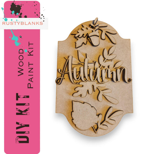 a wooden plaque with the words autumn on it