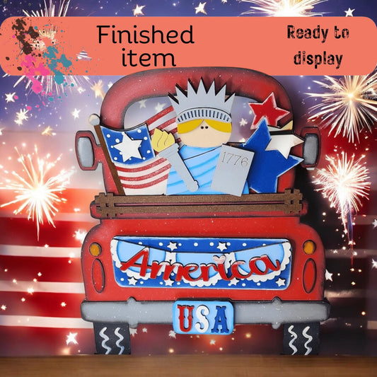 a red truck with fireworks in the background