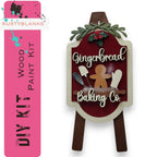 a wooden sign that says gingerbread baking co