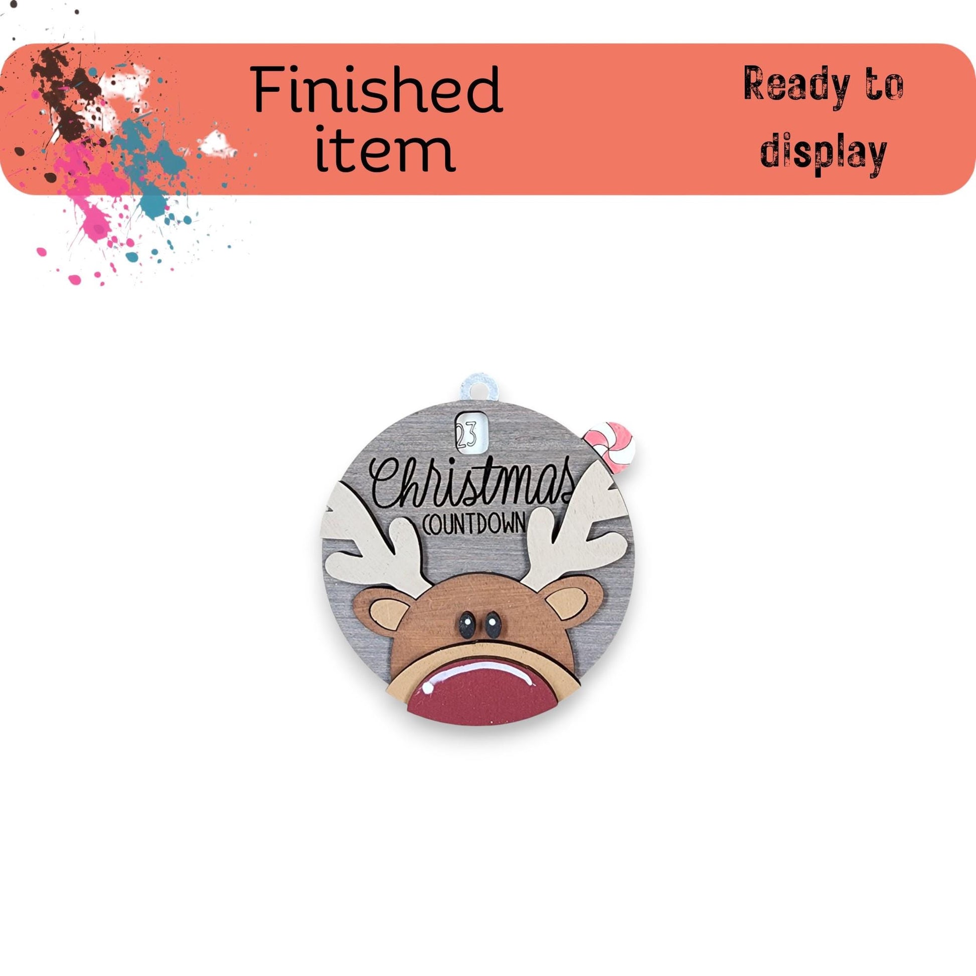 a button with a picture of a reindeer on it