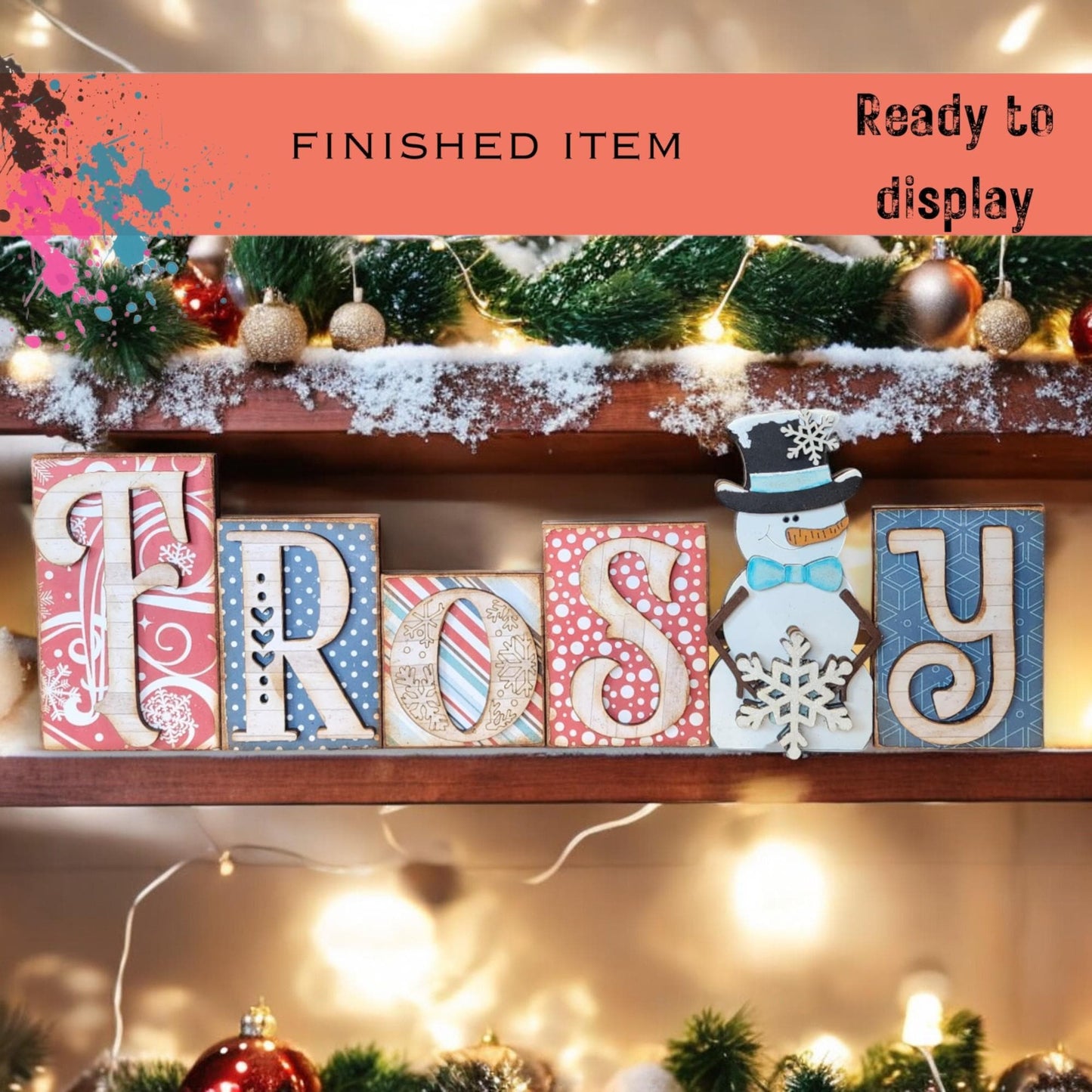 a shelf with christmas decorations and a sign that says frosty