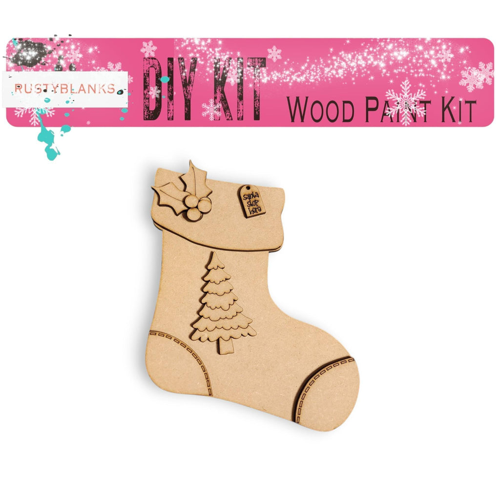a wooden cut out of a christmas stocking