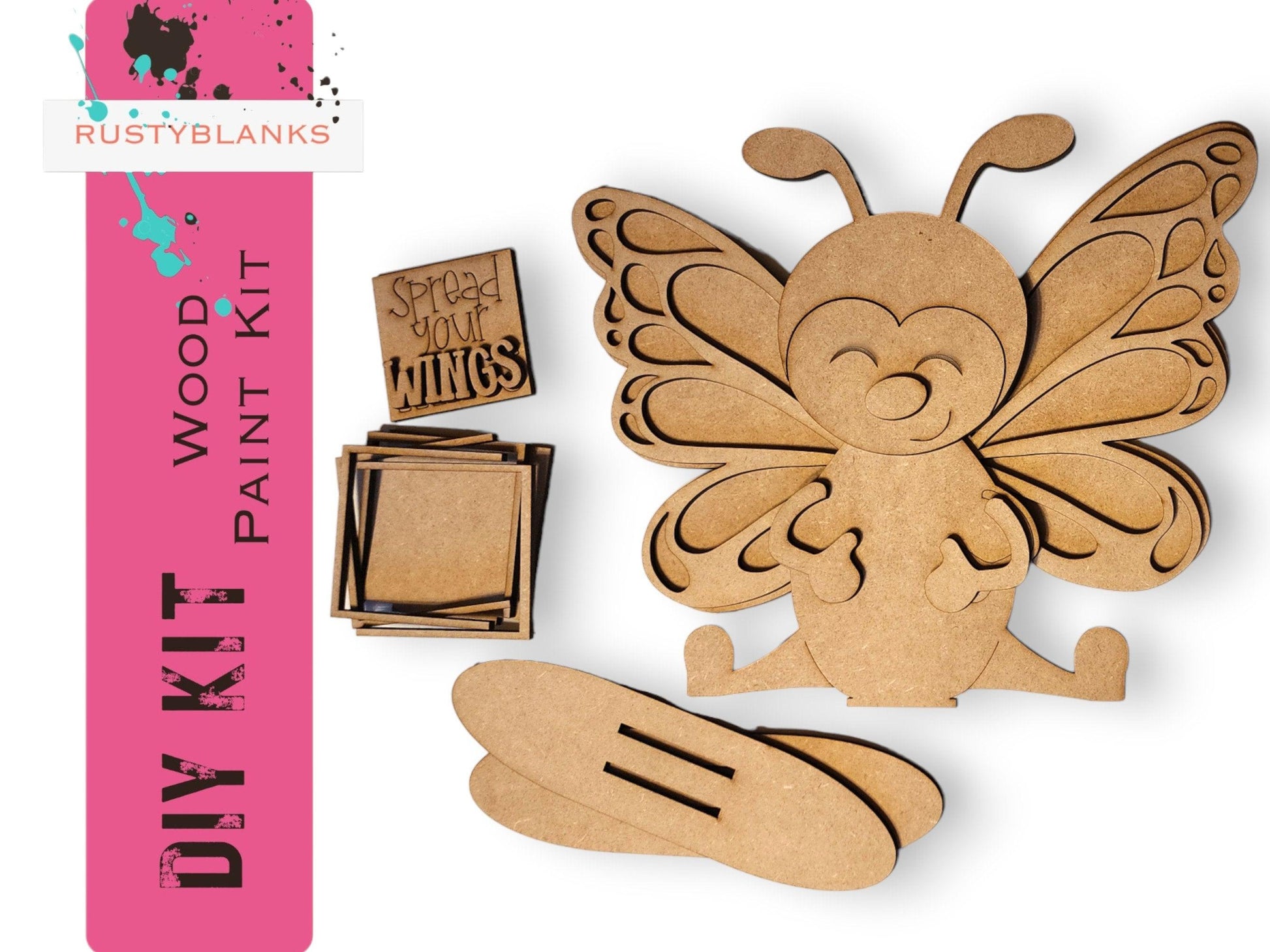 a wooden cut out of a butterfly with a pink background