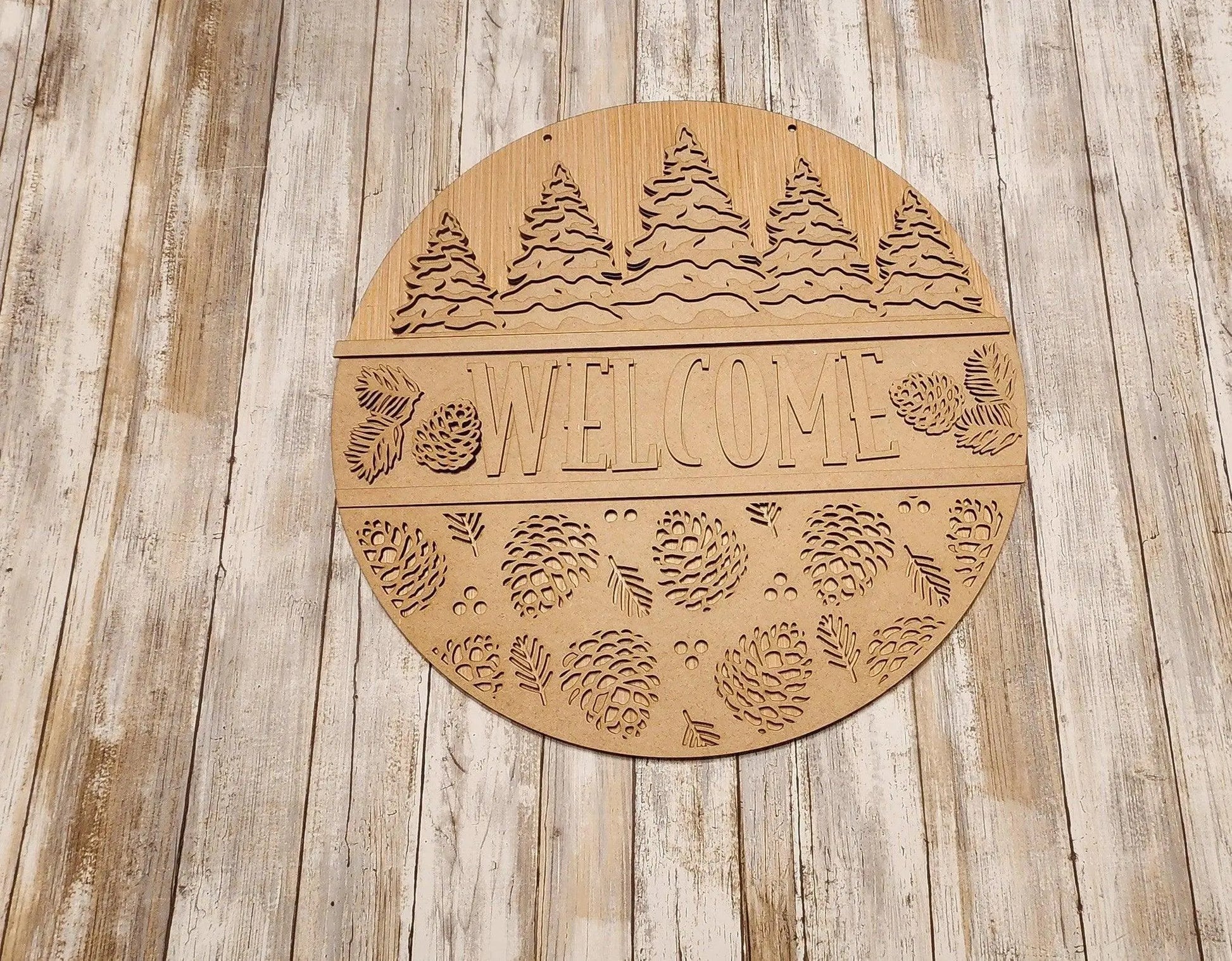 Welcome in Pine Trees and Cones Door Hanger DIY - RusticFarmhouseDecor